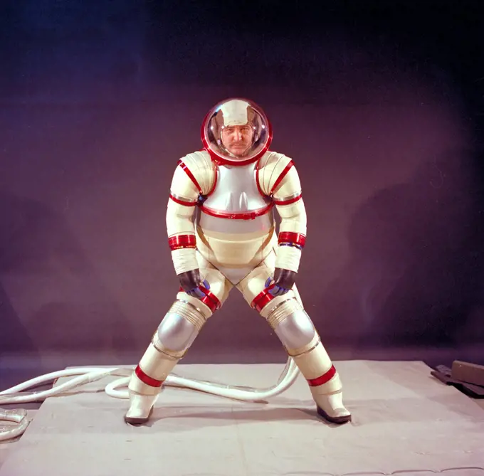 Hubert Vykukal demonstrates mobility of the Hardsuit AX-3 Space Suit design. 