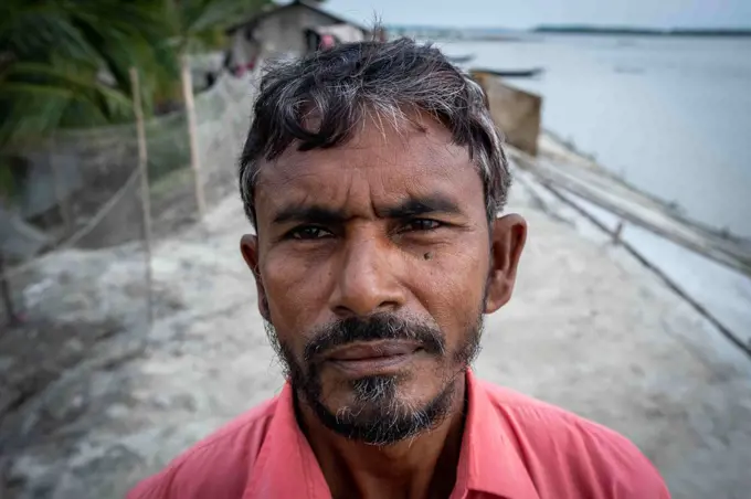 The Pratab Nagar village is severely affected by climate change, including rising water levels, erosion and salinisation. Satkhira Province, Bangladesh. (Photo by: Martin Bertrand/Majority World/UIG)