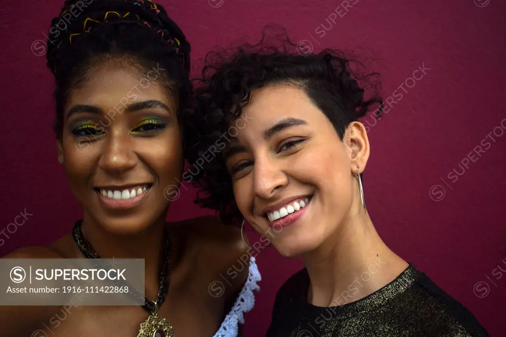 Two latin young women in the streets of Cali, Colombia