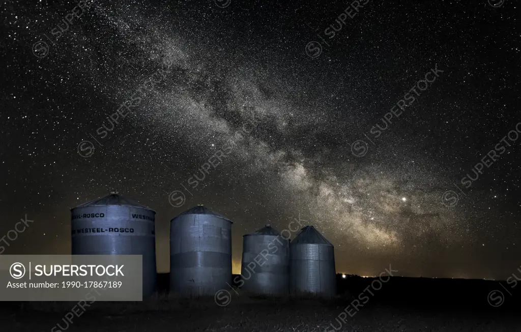 Milkyway over grain bins in rural Manitoba Canada