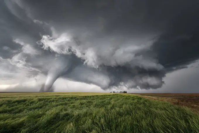 Tornado touching down over a field in Dodge City Kansas United States