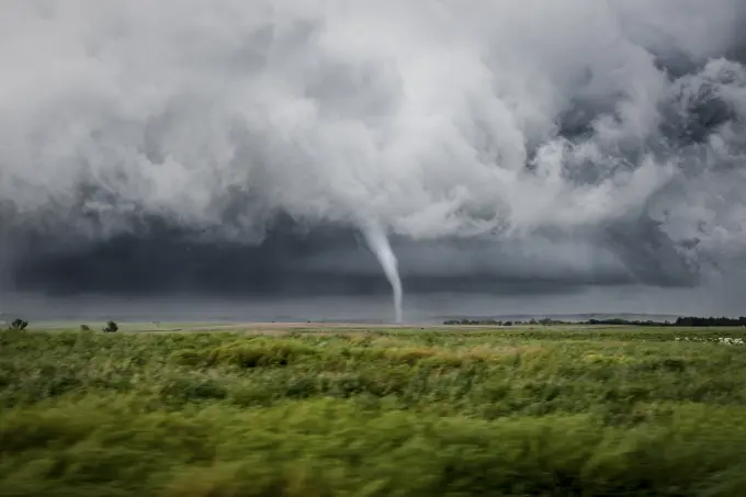 Tornado touches down over a rural field near Hays Kansas United States