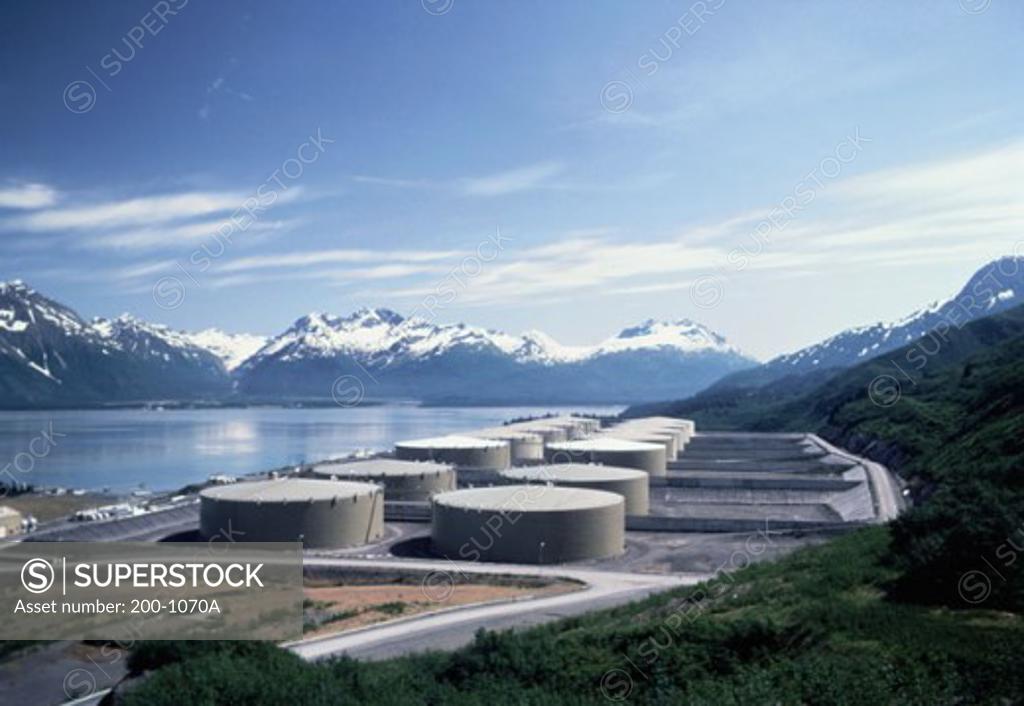 Stock Photo: 200-1070A Oil storage tanks at the riverside