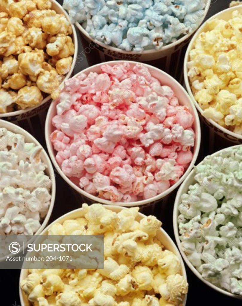 Stock Photo: 204-1071 Close-up of flavored popcorn in disposable cups