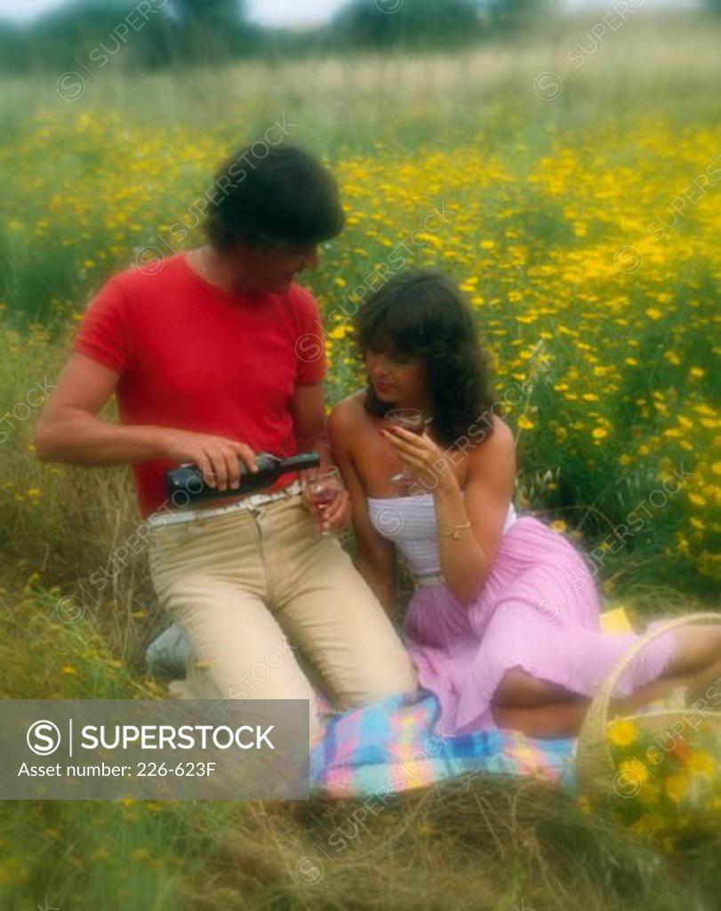 Stock Photo: 226-623F Young couple enjoying at a picnic