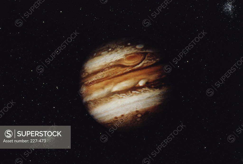 Stock Photo: 227-473 Jupiter As Seen By The Voyager Spacecraft (A Star Bacground Has Been Added By An Artist).