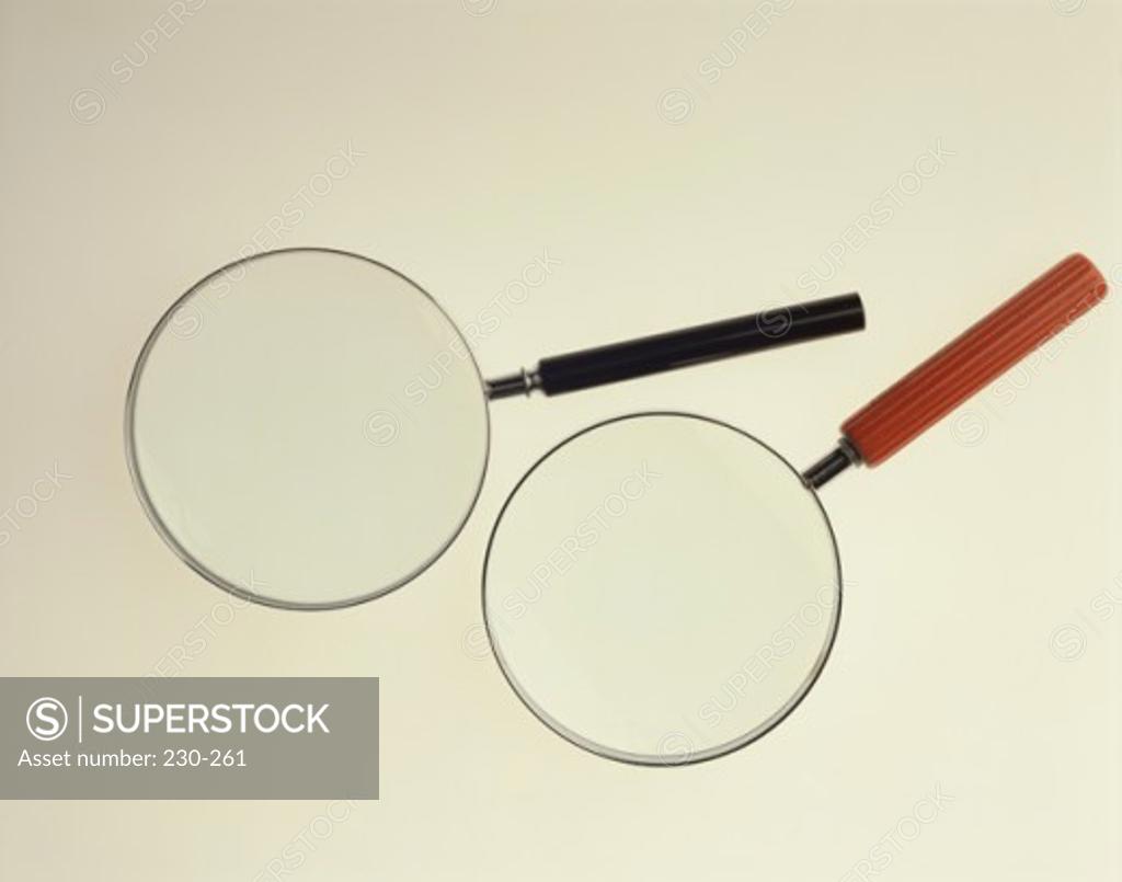 Stock Photo: 230-261 Close-up of two magnifying glasses