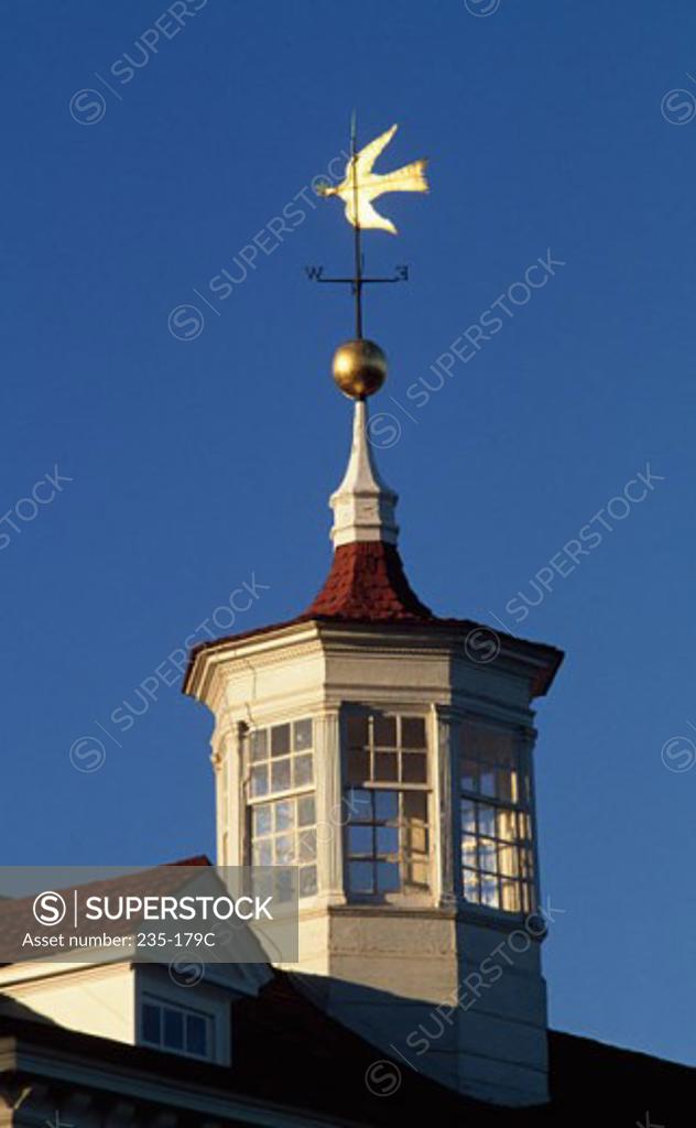 Stock Photo: 235-179C Low angle view of a weather vane on a building