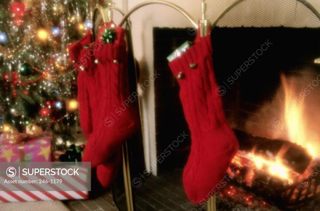 Stock Photo: 246-1179 Close-up of Christmas stockings hanging on a fireplace
