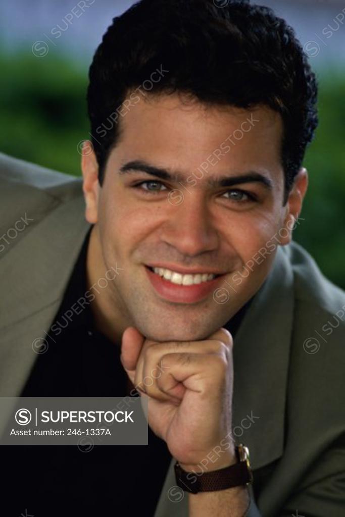 Stock Photo: 246-1337A Close-up of a young man smiling