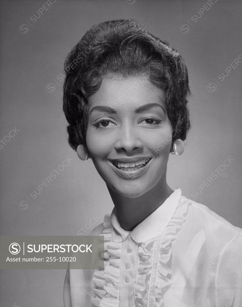 Stock Photo: 255-10020 Portrait of a young woman smiling