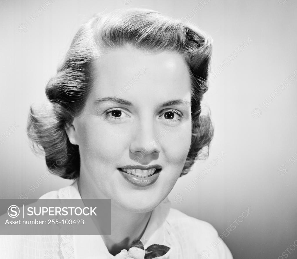 Stock Photo: 255-10349B Portrait of a young woman smiling