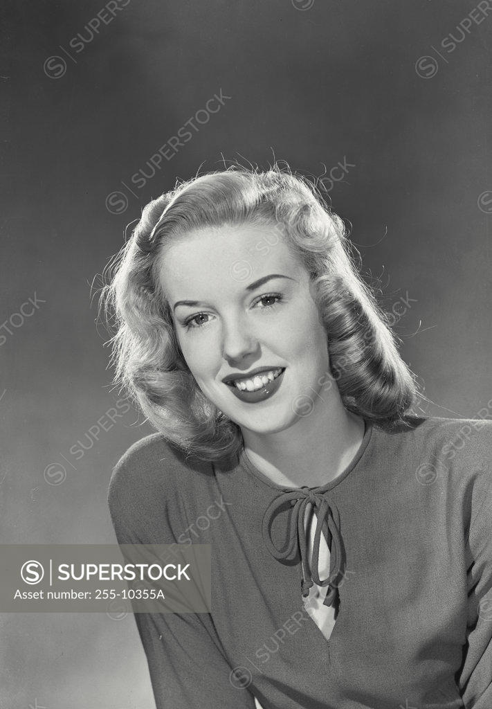 Stock Photo: 255-10355A Portrait of a young woman smiling