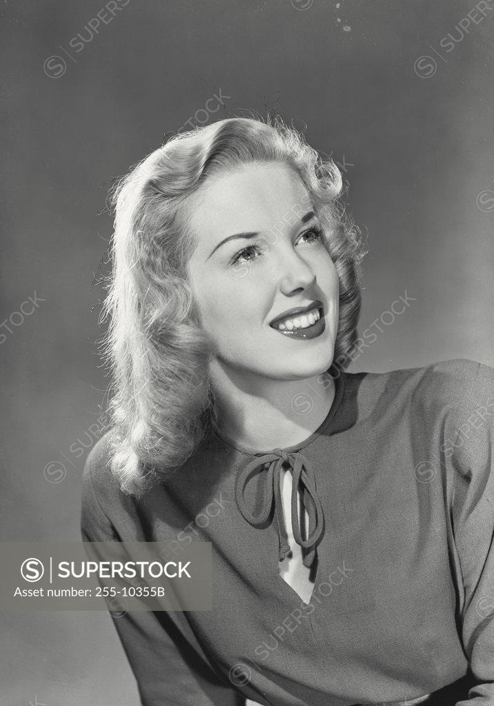 Stock Photo: 255-10355B Close-up of a young woman smiling