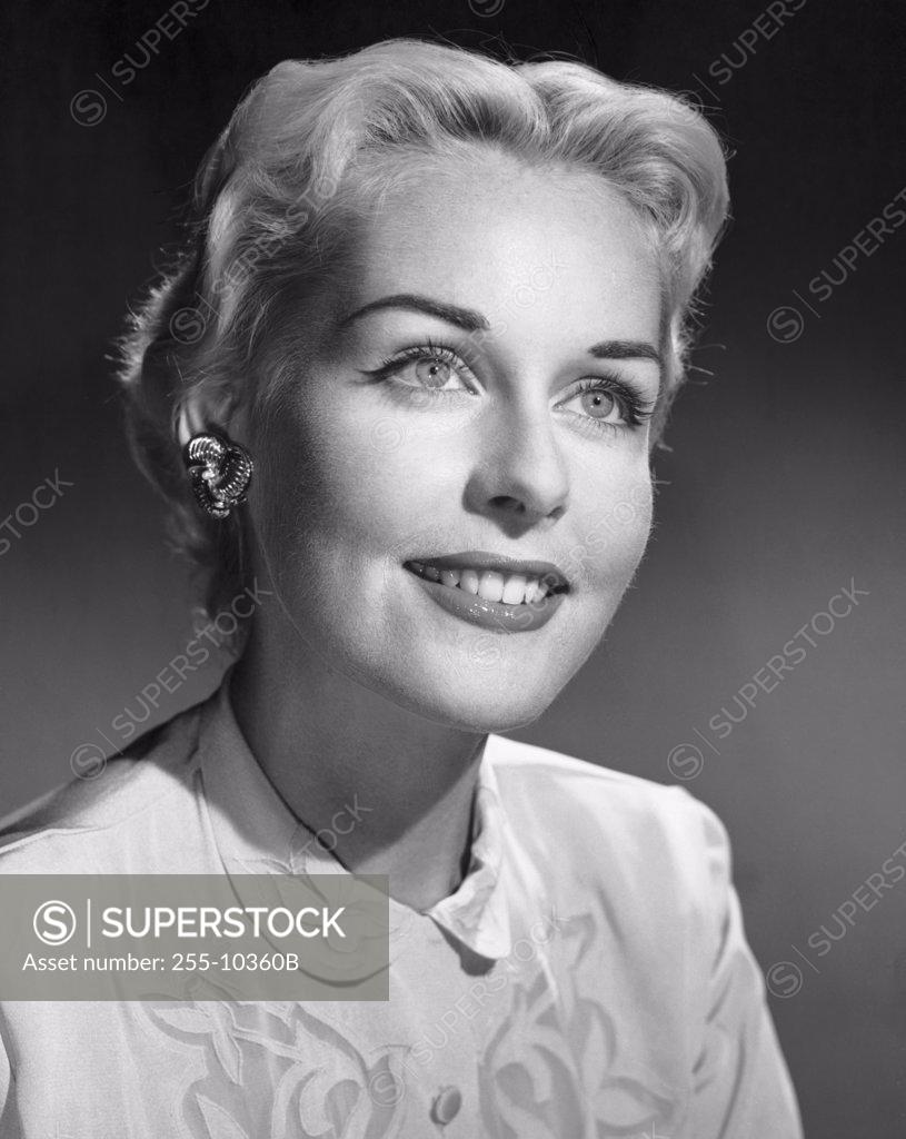 Stock Photo: 255-10360B Close-up of a young woman smiling