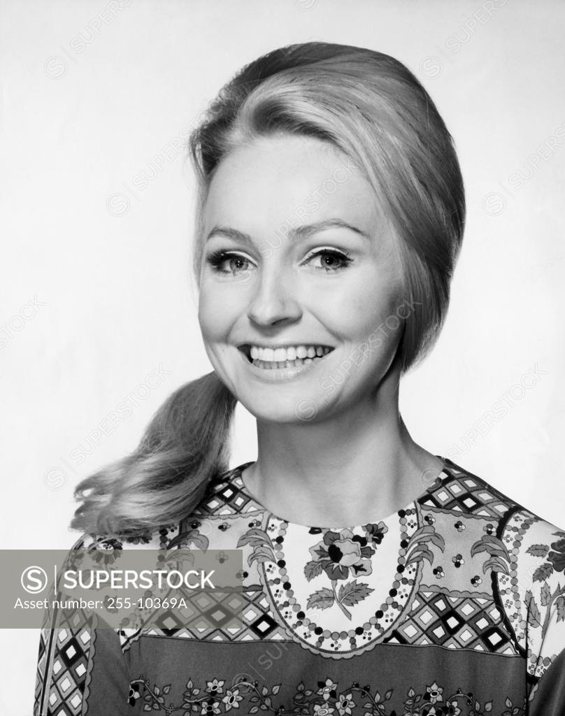 Stock Photo: 255-10369A Portrait of a young woman smiling