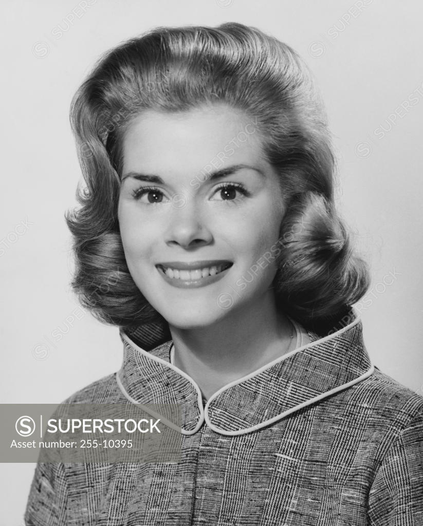 Stock Photo: 255-10395 Portrait of a young woman smiling