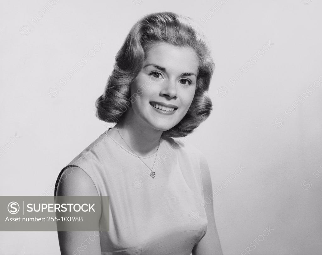 Stock Photo: 255-10398B Portrait of a young woman smiling