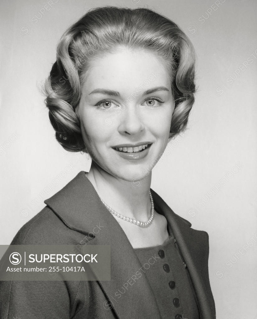 Stock Photo: 255-10417A Portrait of a young woman smiling