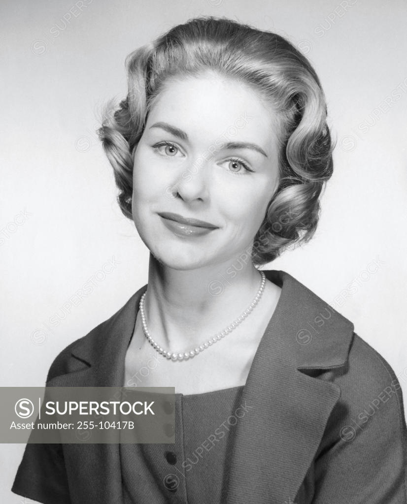 Stock Photo: 255-10417B Portrait of a young woman smiling