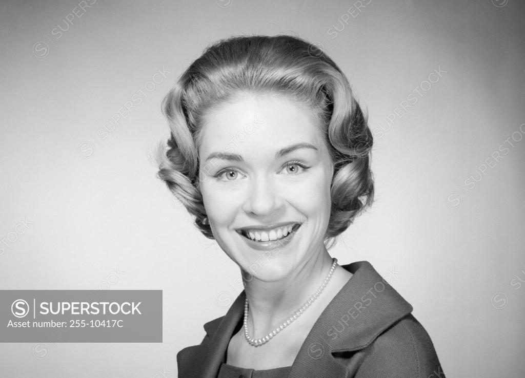 Stock Photo: 255-10417C Portrait of a young woman smiling