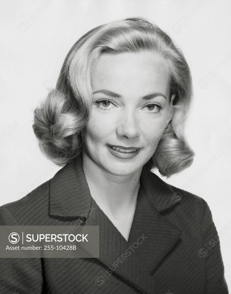 Stock Photo: 255-10428B Portrait of a young woman smiling
