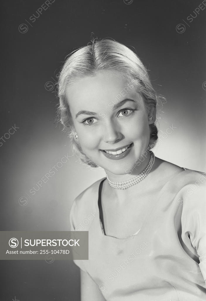Stock Photo: 255-10478D Portrait of a young woman smiling