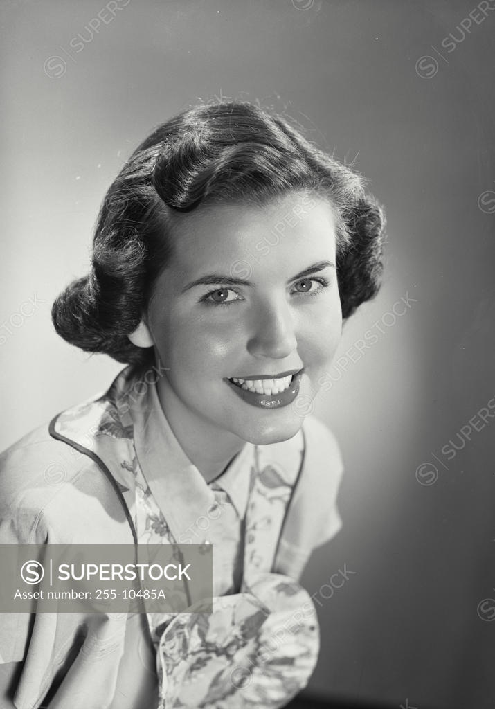 Stock Photo: 255-10485A Portrait of a young woman smiling