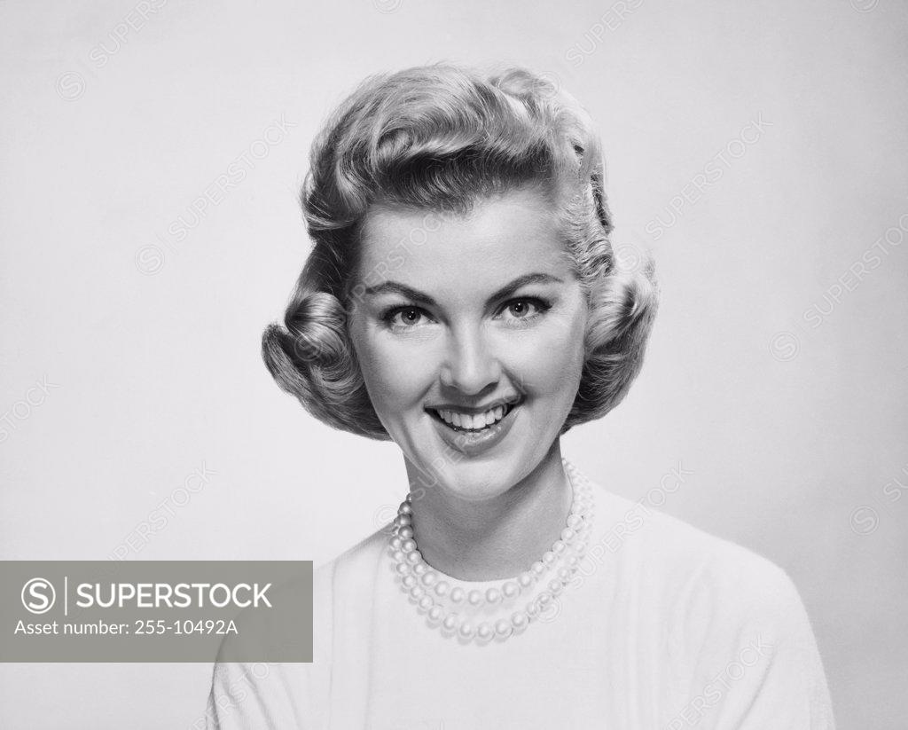 Stock Photo: 255-10492A Portrait of a young woman smiling