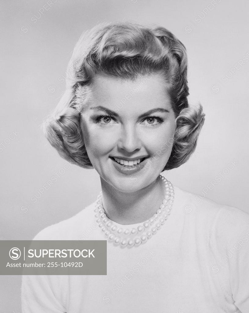 Stock Photo: 255-10492D Portrait of a young woman smiling