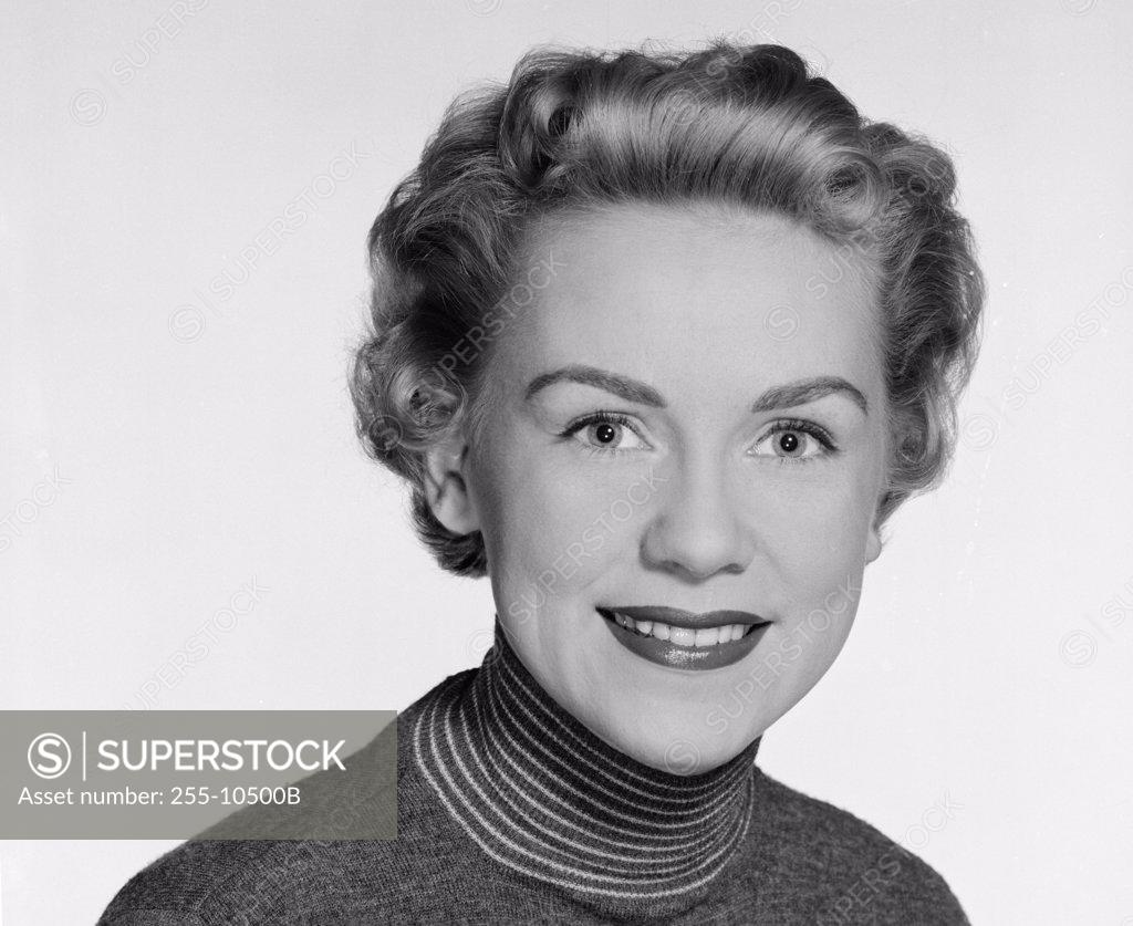 Stock Photo: 255-10500B Portrait of a young woman smiling