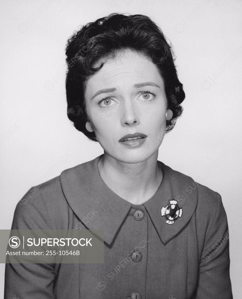 Stock Photo: 255-10546B Portrait of a young woman frowning