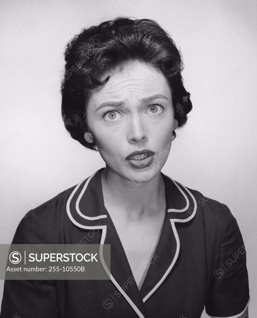 Stock Photo: 255-10550B Portrait of a young woman frowning