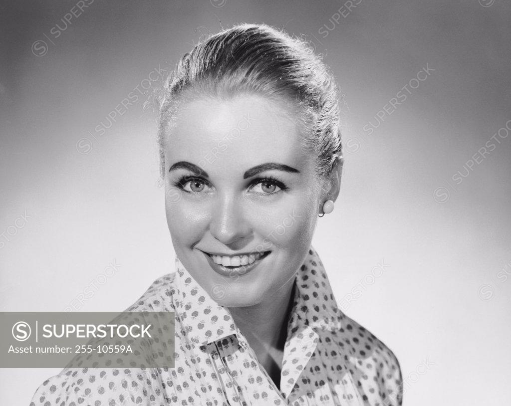 Stock Photo: 255-10559A Portrait of a young woman smiling