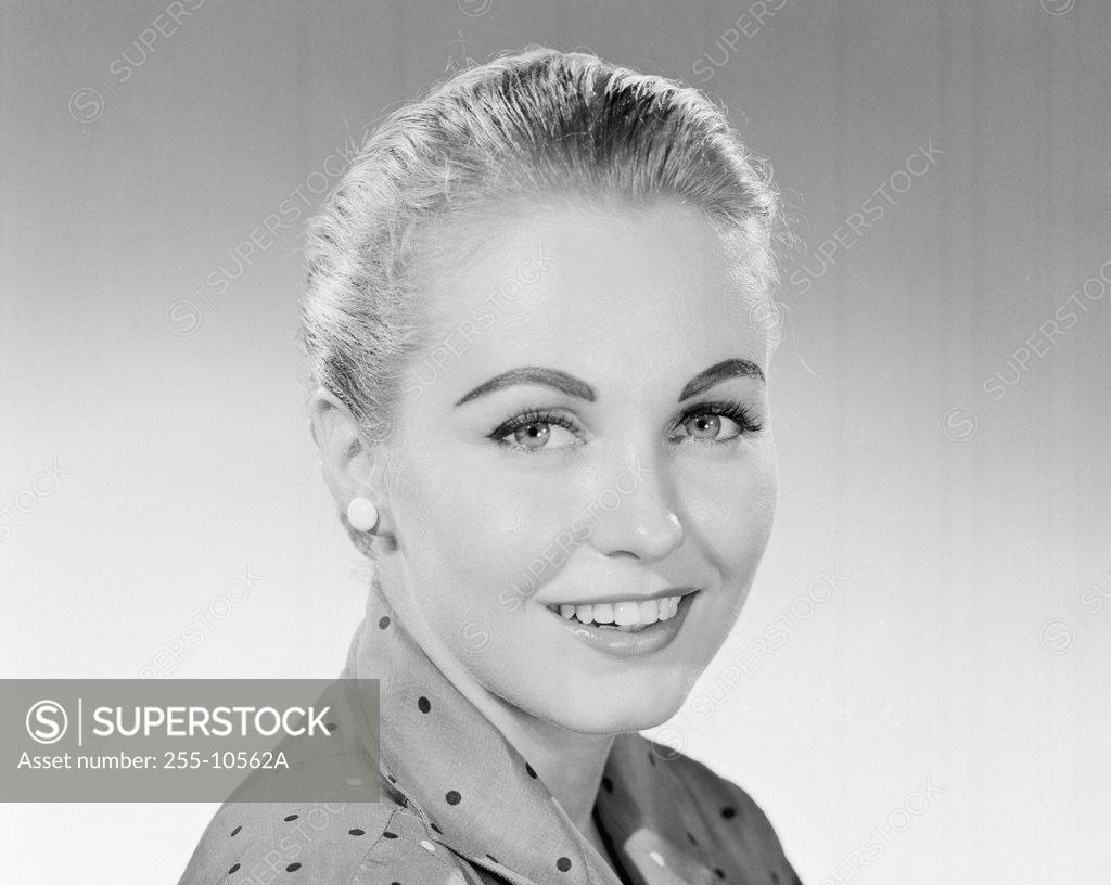 Stock Photo: 255-10562A Portrait of a young woman smiling
