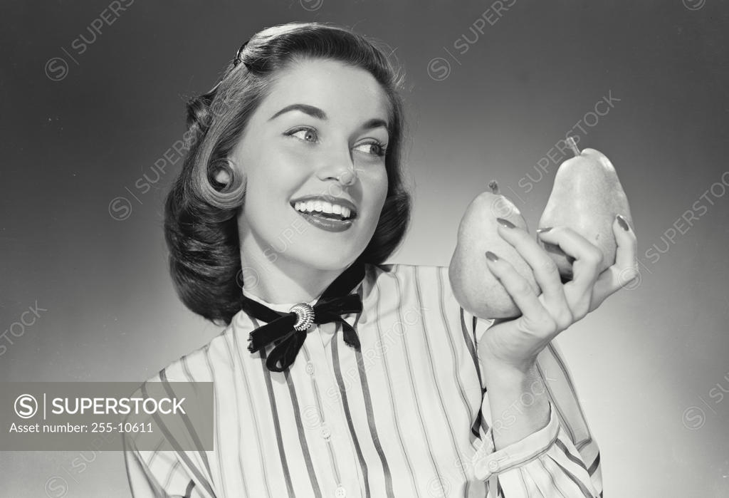 Stock Photo: 255-10611 Young woman smiling