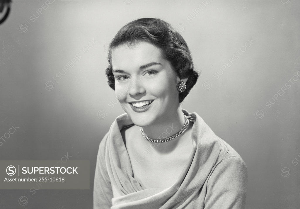 Stock Photo: 255-10618 Portrait of a young woman smiling