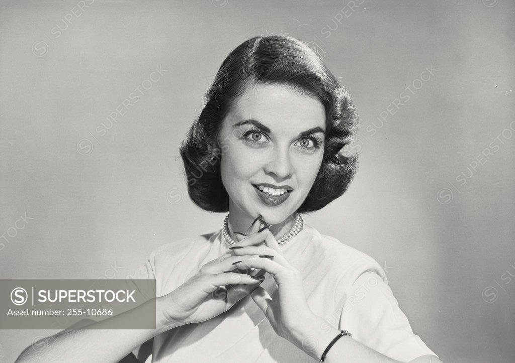 Stock Photo: 255-10686 Portrait of a young woman smiling