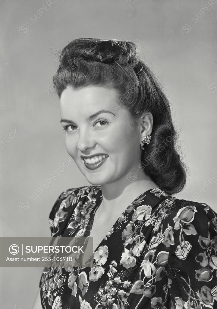 Stock Photo: 255-10691B Portrait of a young woman smiling