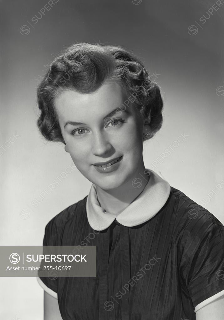 Stock Photo: 255-10697 Portrait of a young woman smiling