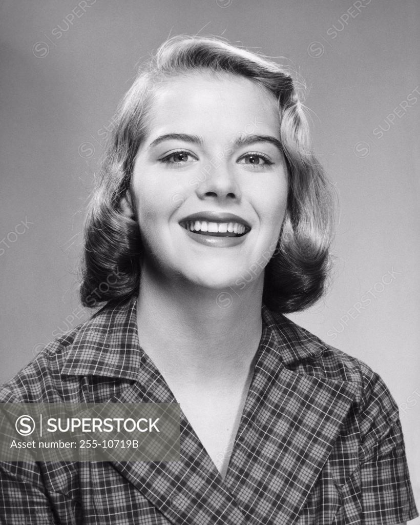 Stock Photo: 255-10719B Portrait of a young woman smiling