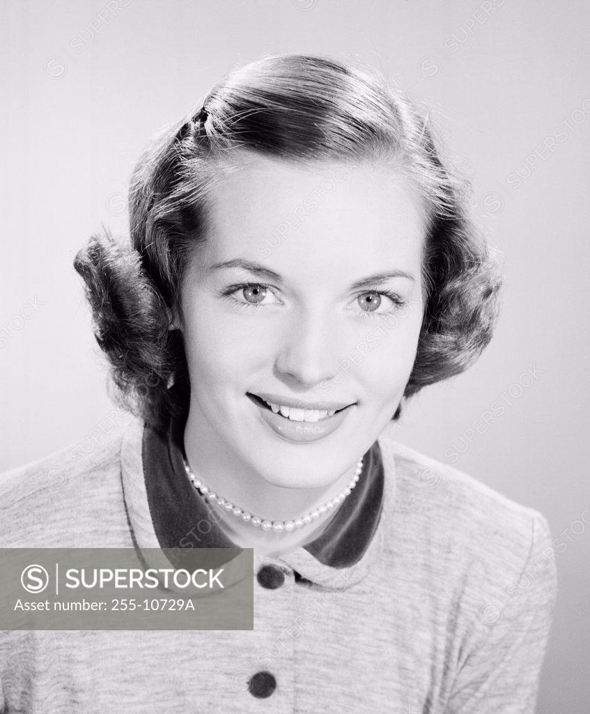 Stock Photo: 255-10729A Portrait of a young woman smiling