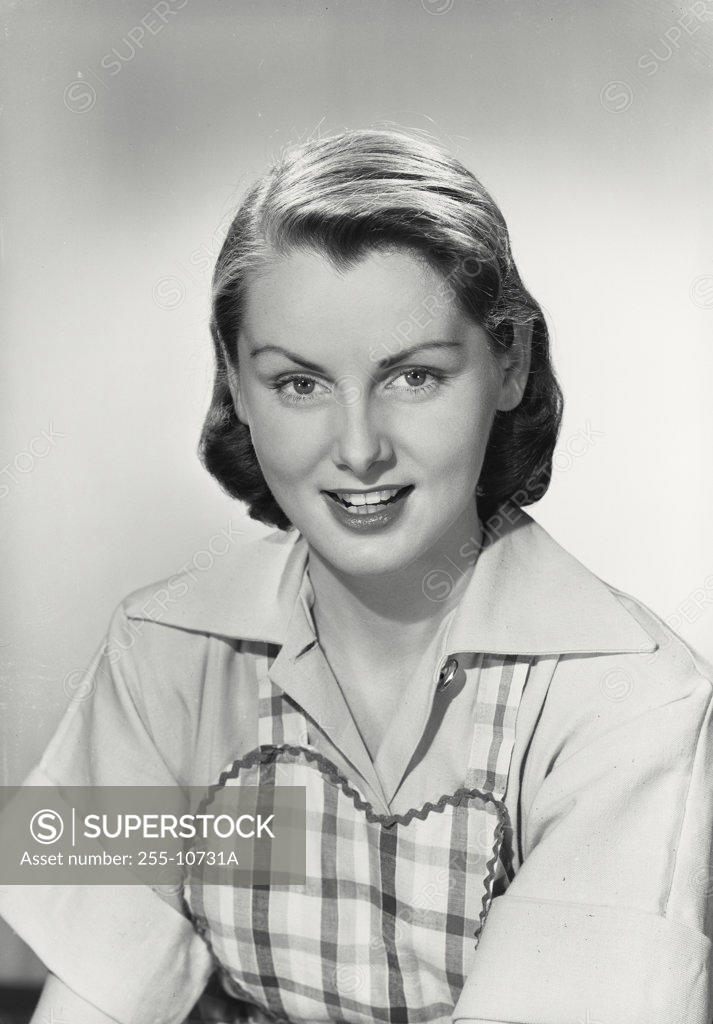 Stock Photo: 255-10731A Portrait of a young woman smiling