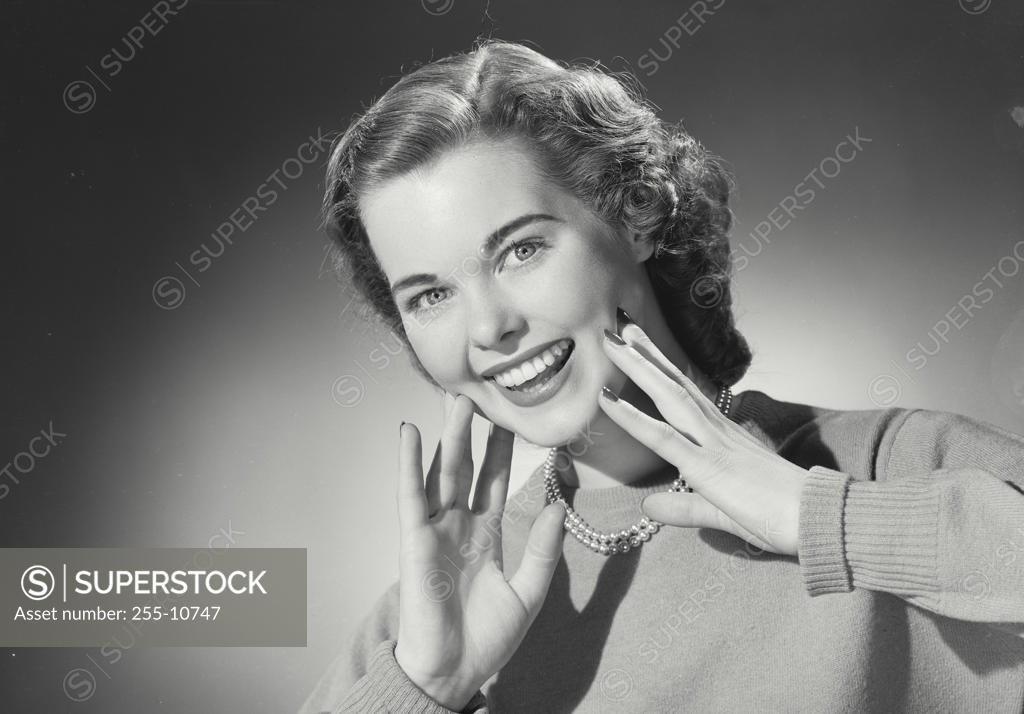 Stock Photo: 255-10747 Portrait of a young woman smiling
