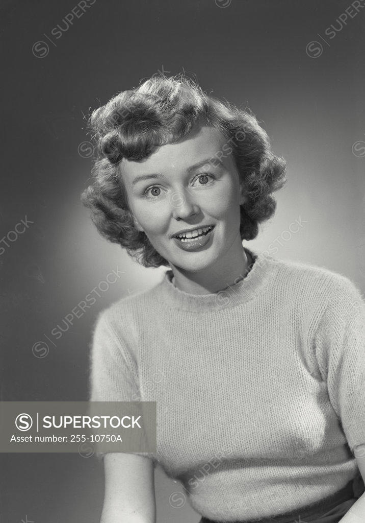 Stock Photo: 255-10750A Portrait of a young woman smiling