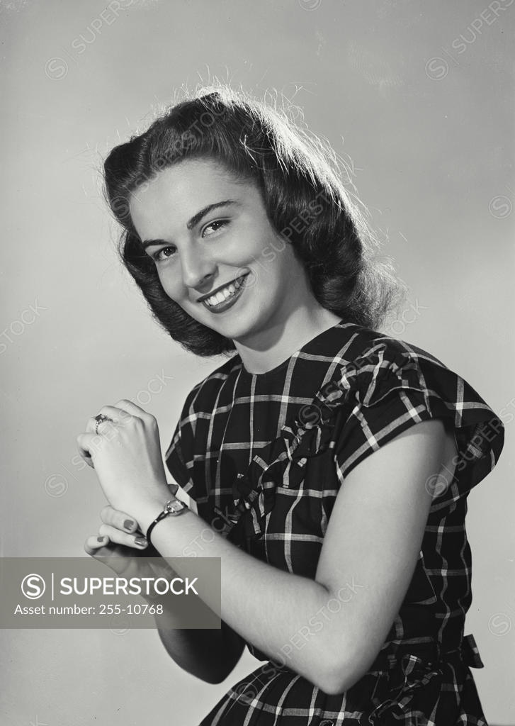 Stock Photo: 255-10768 Portrait of a young woman smiling