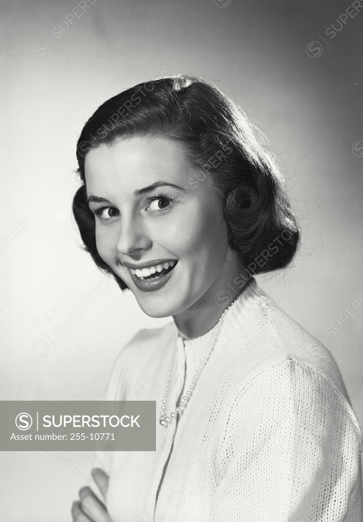 Stock Photo: 255-10771 Portrait of a young woman smiling