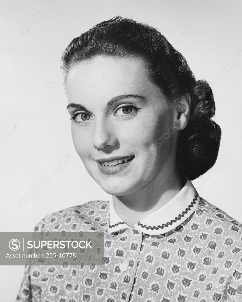 Stock Photo: 255-10778 Portrait of a young woman smiling