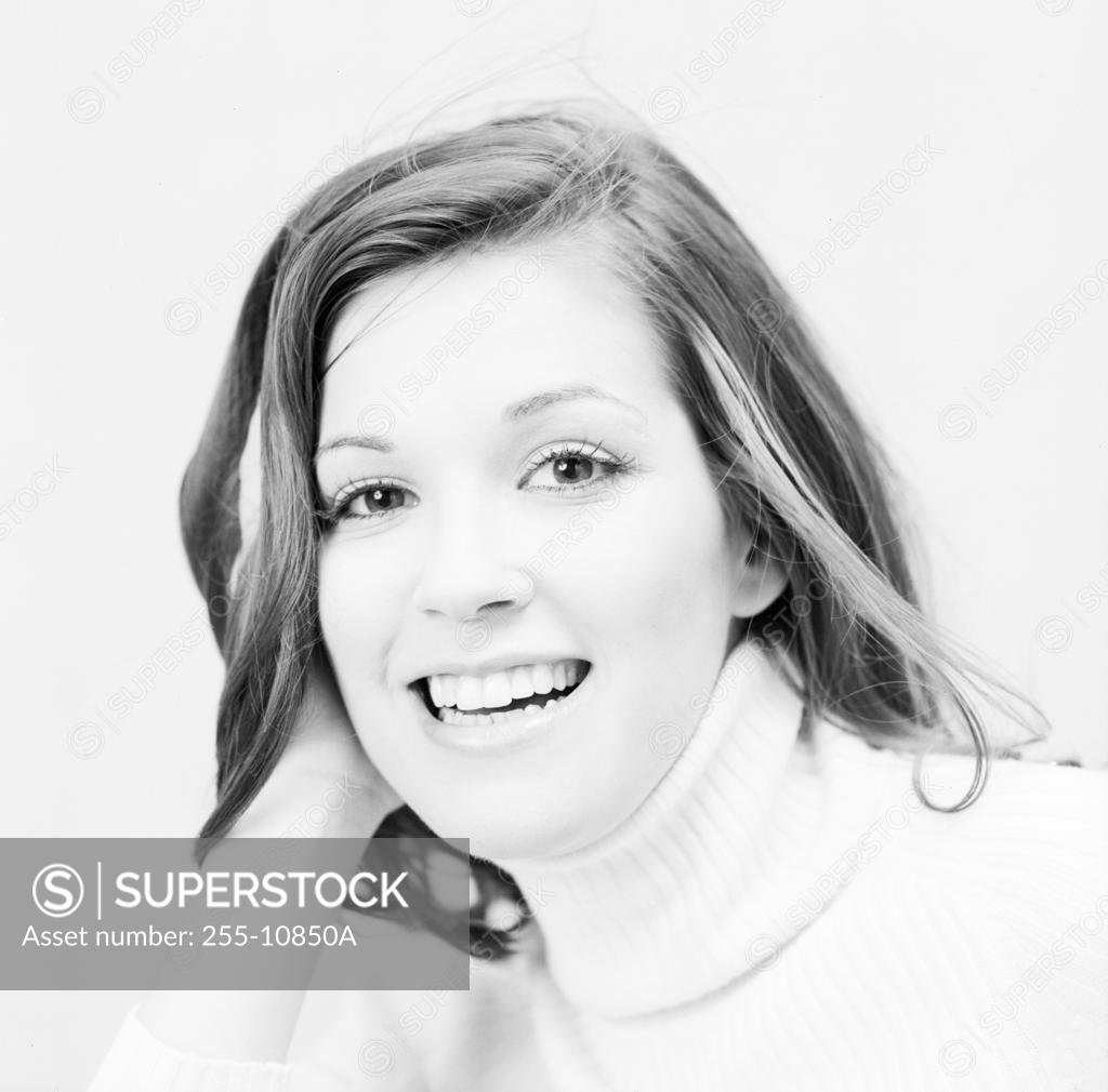 Stock Photo: 255-10850A Portrait of a young woman smiling