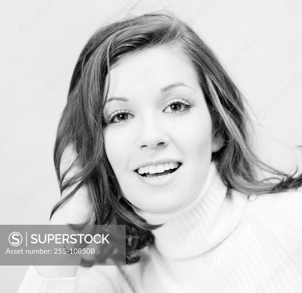 Stock Photo: 255-10850B Portrait of a young woman smiling